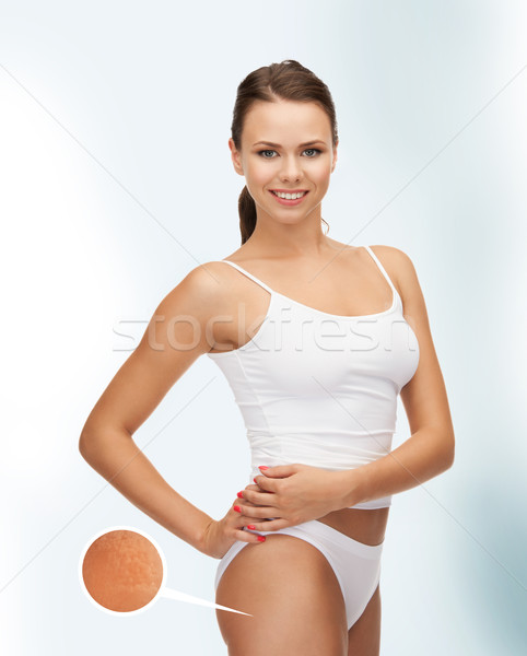 Donna lente di ingrandimento cellulite foto felice Foto d'archivio © dolgachov