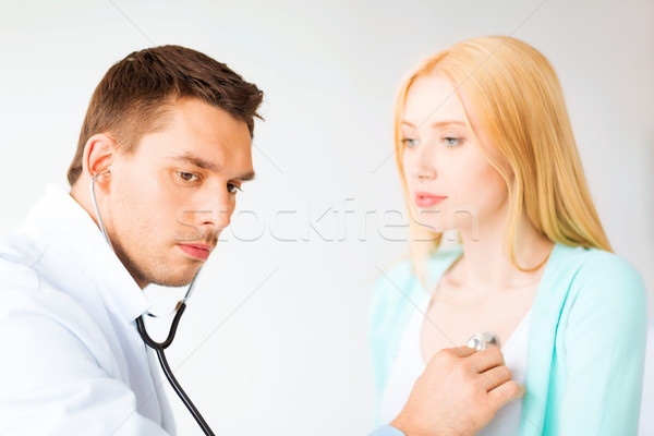 Stock photo: male doctor with patient