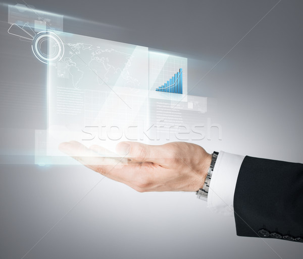 Zakenman hand tonen grafiek virtueel scherm Stockfoto © dolgachov