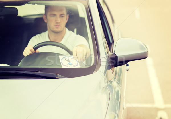 Stockfoto: Man · parkeren · klok · auto · dashboard · vervoer