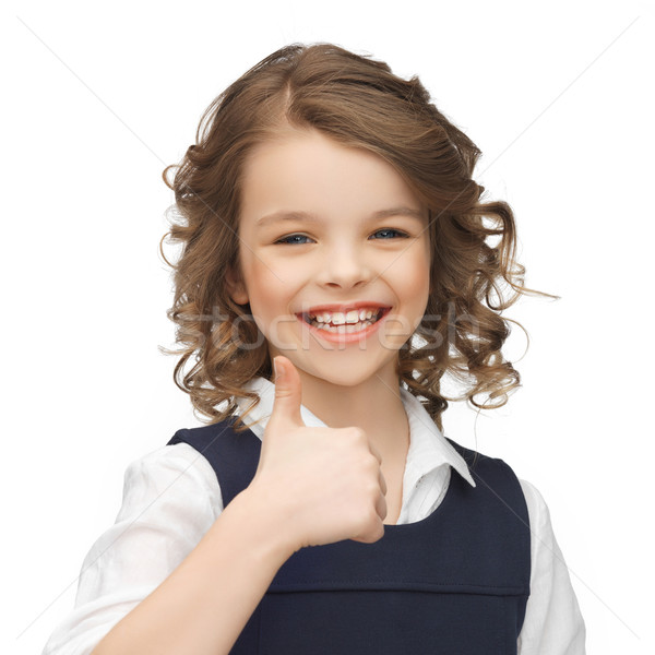 pre-teen girl showing thumbs up Stock photo © dolgachov