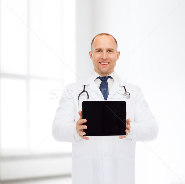 Sorridente médico do sexo masculino estetoscópio medicina anúncio Foto stock © dolgachov