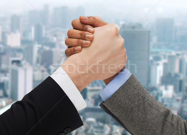 hands of two people arm wrestling Stock photo © dolgachov