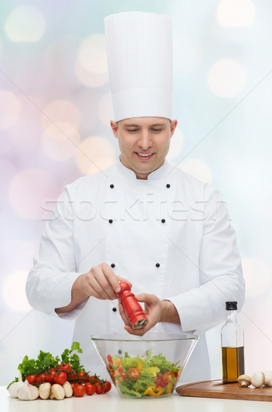 happy male chef cook cooking food Stock photo © dolgachov