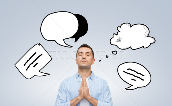 Stock photo: man praying to god with text bubble doodles