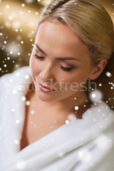 Stock photo: close up of woman sitting in bath robe at spa
