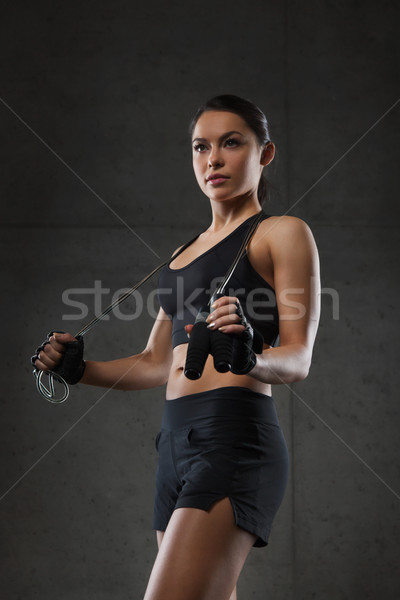 young sporty woman with jumping rope Stock photo © dolgachov