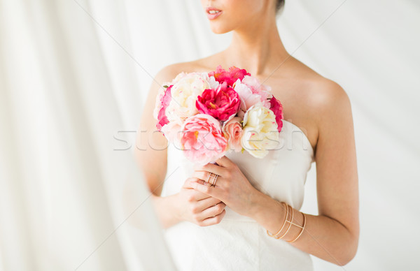 close up of woman or bride with flower bouquet Stock photo © dolgachov