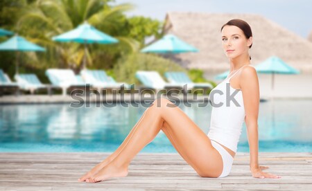 happy young woman in pink bikini swimsuit on beach Stock photo © dolgachov