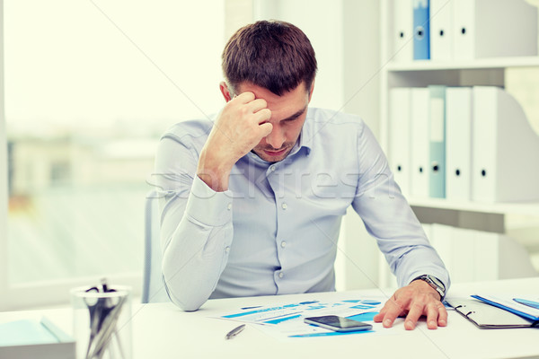 Stock photo: close up of businessman with smartphone