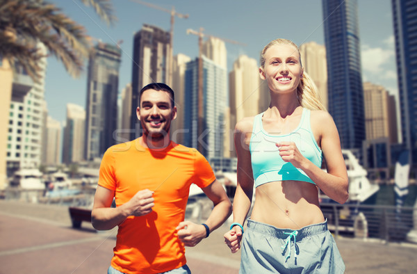 Couple courir Dubaï rue de la ville fitness sport Photo stock © dolgachov