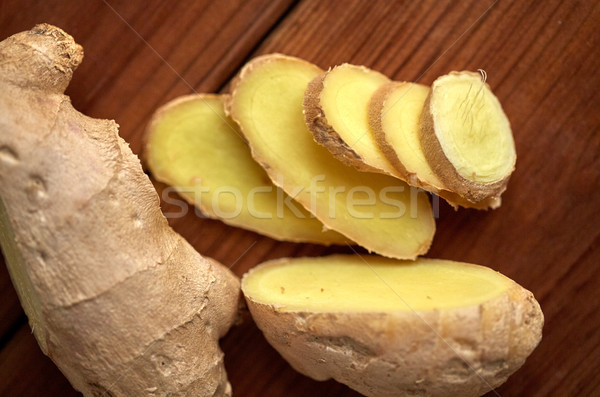 close up of ginger root on wooden table Stock photo © dolgachov