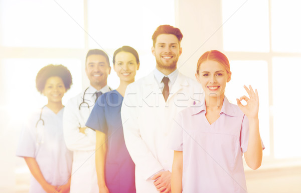 group of doctors and nurses at hospital Stock photo © dolgachov