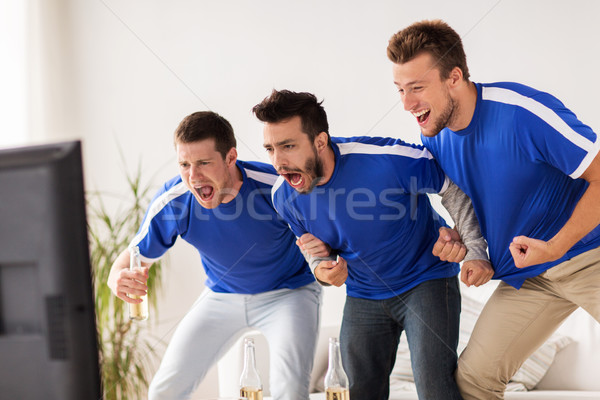 Foto stock: Amigos · fútbol · aficionados · viendo · fútbol · casa