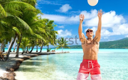 happy woman in bikini swimsuit on tropical beach Stock photo © dolgachov