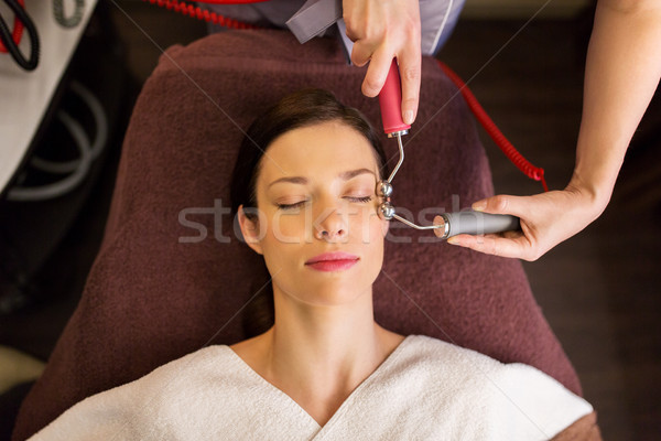 woman having hydradermie facial treatment in spa Stock photo © dolgachov