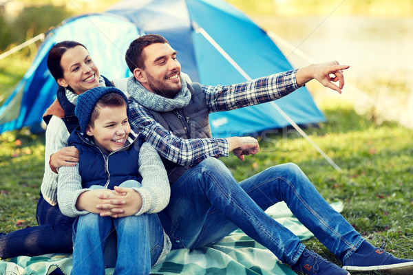 happy family with tent at camp site Stock photo © dolgachov