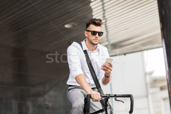 Hombre bicicleta calle de la ciudad estilo de vida transporte Foto stock © dolgachov