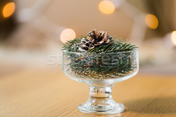 christmas fir decoration with cone in dessert bowl Stock photo © dolgachov