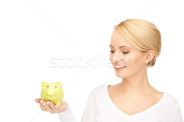 lovely woman with piggy bank Stock photo © dolgachov