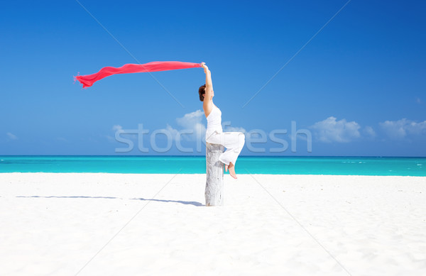happy woman on the beach Stock photo © dolgachov