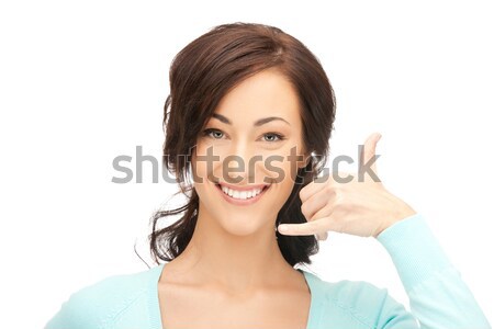 woman making a call me gesture Stock photo © dolgachov