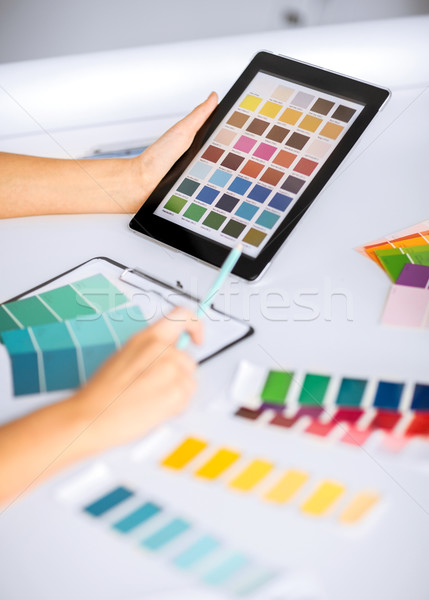 woman working with color samples for selection Stock photo © dolgachov