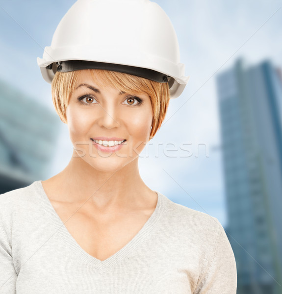 female contractor in helmet Stock photo © dolgachov