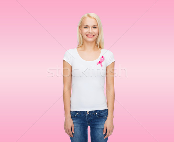 Femeie zambitoare roz cancer constientizare panglică asistenţă medicală Imagine de stoc © dolgachov