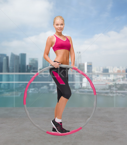 Jonge vrouw hoelahoep fitness sport Stockfoto © dolgachov