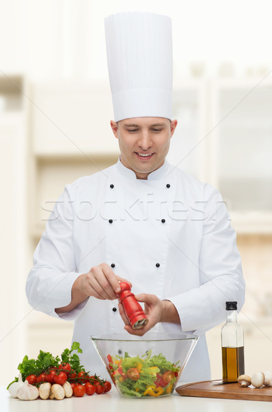 happy male chef cook cooking food Stock photo © dolgachov