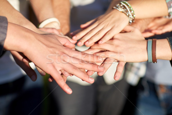 close up of people hands on top Stock photo © dolgachov
