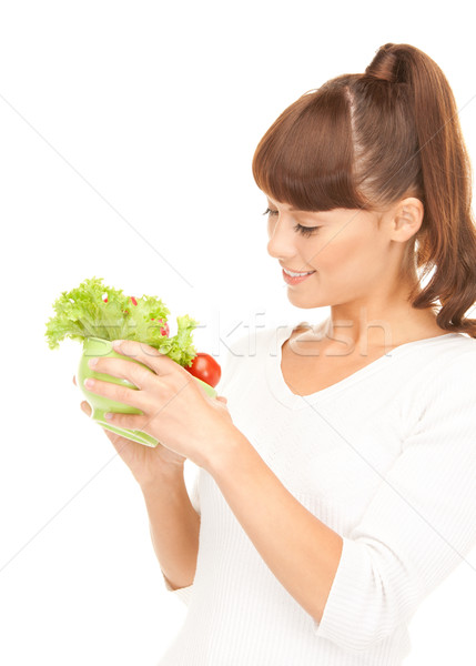 beautiful housewife with vegetables Stock photo © dolgachov