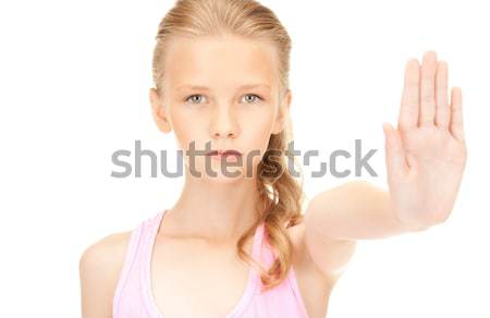 lovely girl showing stop sign Stock photo © dolgachov