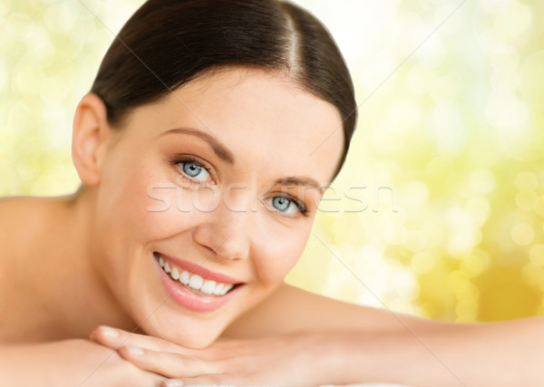 beautiful smiling woman in spa salon Stock photo © dolgachov