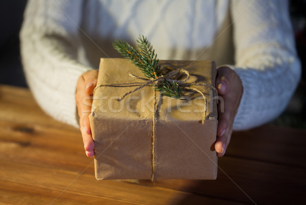 close up of woman with christmas gift or parcel Stock photo © dolgachov