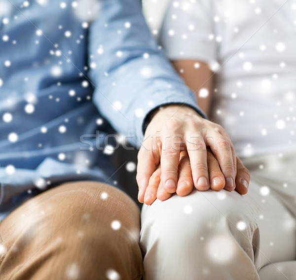 close up of happy male gay couple holding hands Stock photo © dolgachov