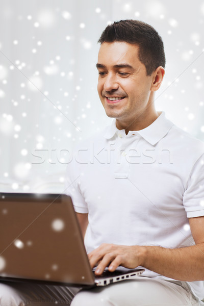 Stockfoto: Gelukkig · man · werken · laptop · computer · home · technologie