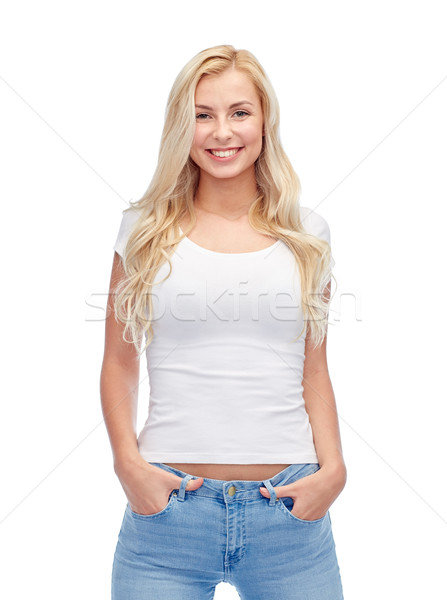 happy young woman or teenage girl in white t-shirt Stock photo © dolgachov