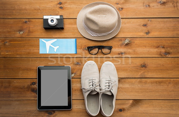 close up of gadgets and traveler personal stuff Stock photo © dolgachov