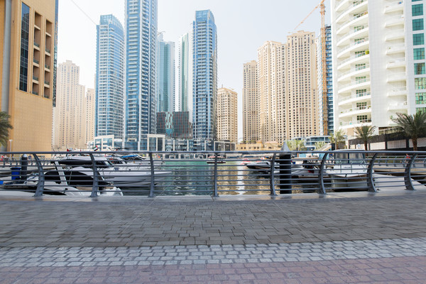 Dubai city seafront or harbor with boats Stock photo © dolgachov
