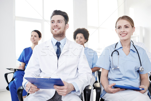 Grupo feliz médicos seminario hospital profesión Foto stock © dolgachov