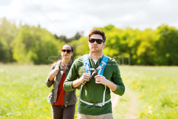couple with backpacks hiking outdoors Stock photo © dolgachov