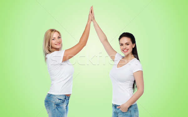 Groupe heureux différent femmes blanche amitié [[stock_photo]] © dolgachov