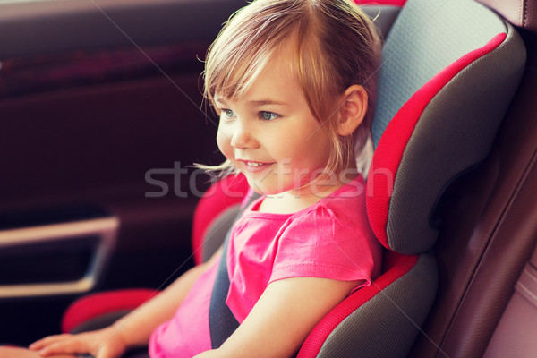 Boldog kislány ül baba autó ülés Stock fotó © dolgachov
