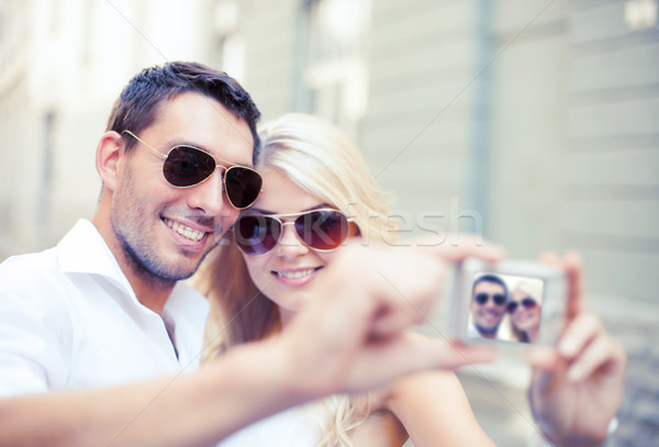 couple taking photo in cafe Stock photo © dolgachov