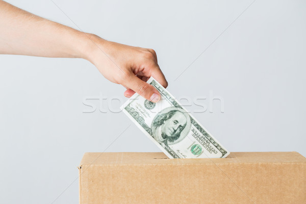 Adam dolar para bağış kutu hayır Stok fotoğraf © dolgachov