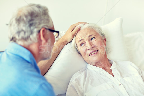 senior couple meeting at hospital ward Stock photo © dolgachov