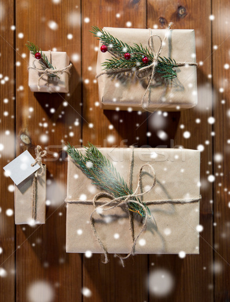 close up of christmas gifts with fir branch Stock photo © dolgachov