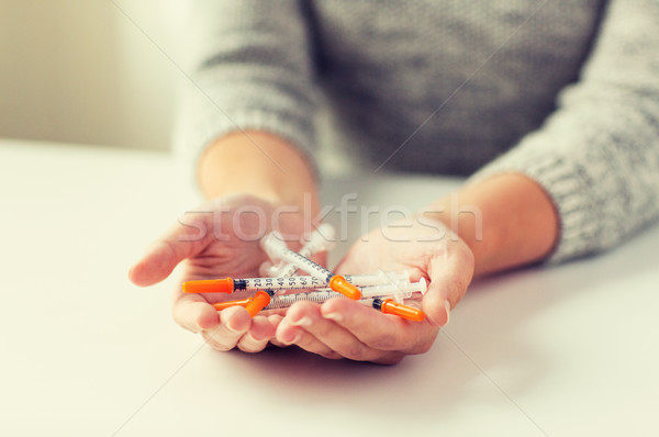 Közelkép nő kezek tart inzulin gyógyszer Stock fotó © dolgachov